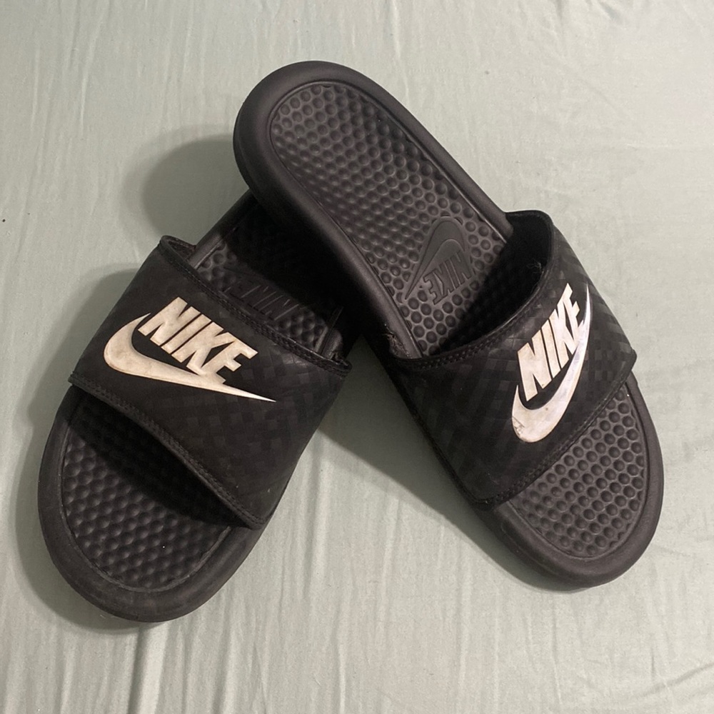 Black Nike slides